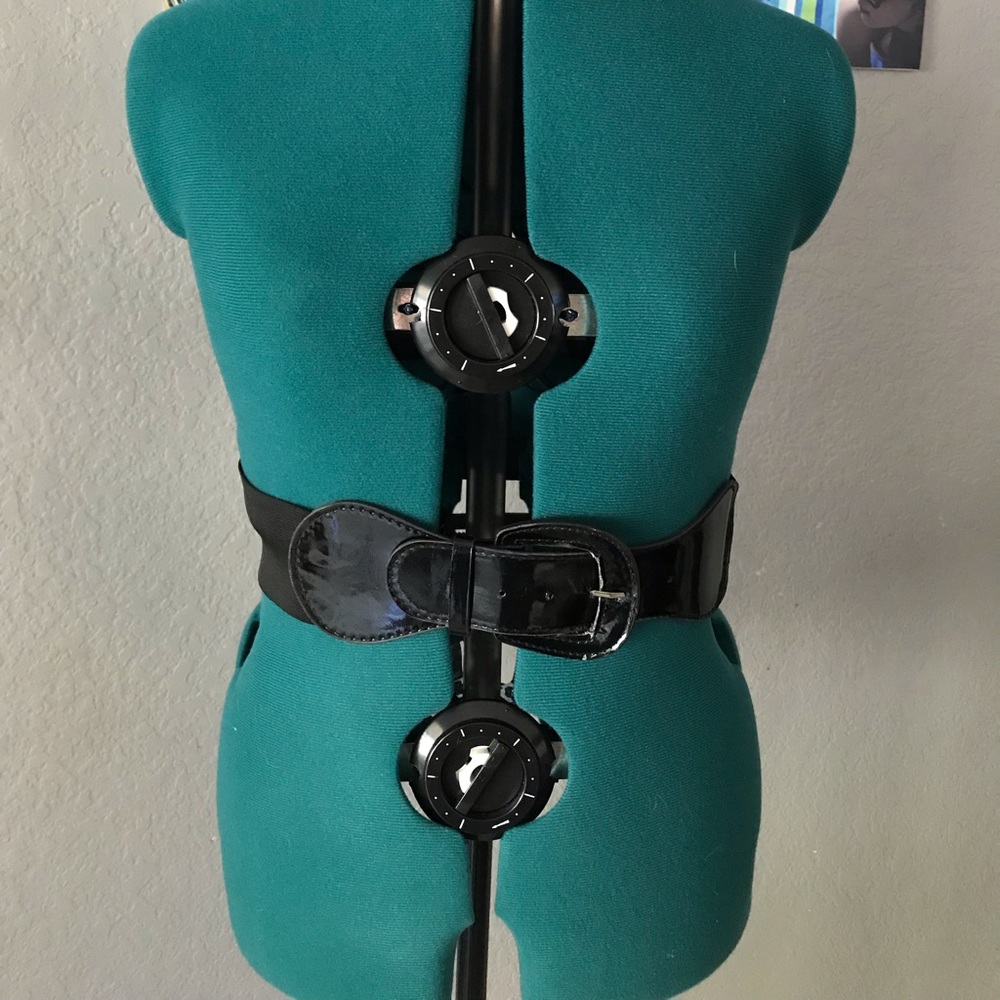 Waist hugging, figure forming belt, black, good condition